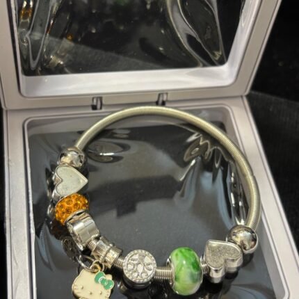 Emerald Whispers Charm Bracelet